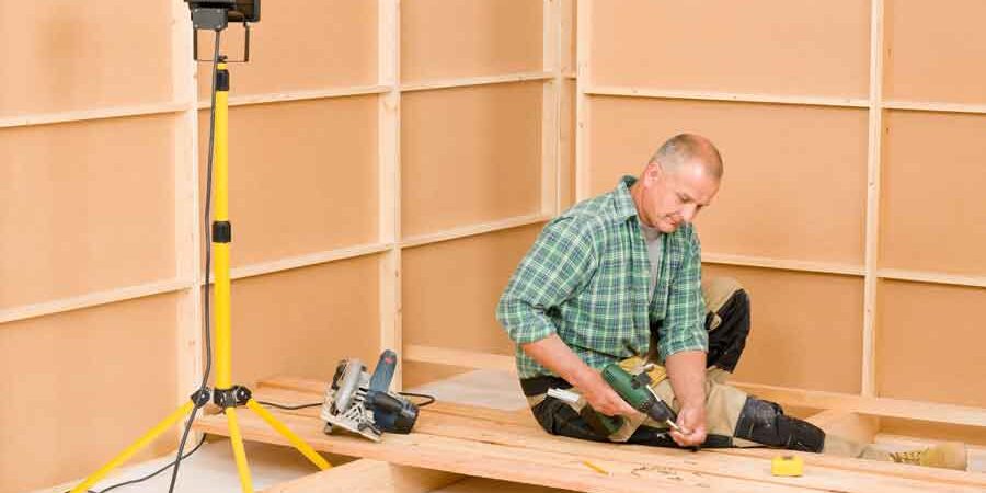Reasons-to-Refinance Reasons to Refinance man installing new wood floor