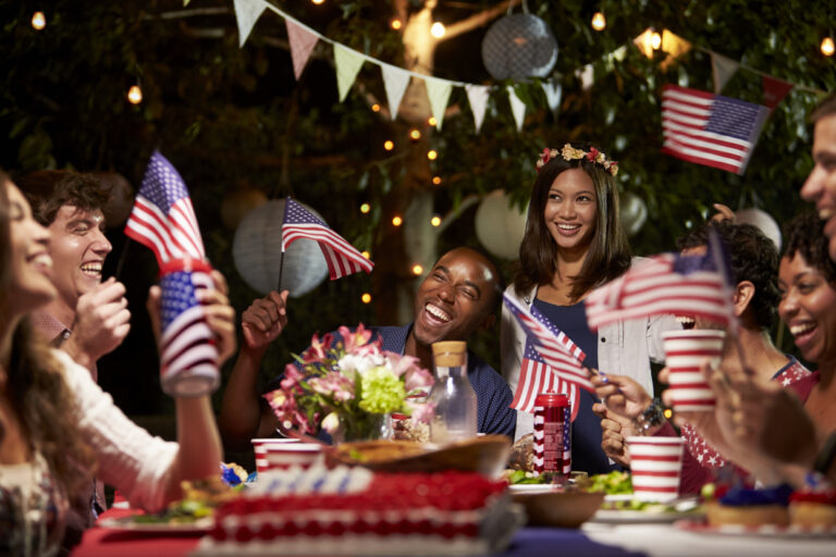 Friends Celebrating 4th Of July Holiday With Backyard Party