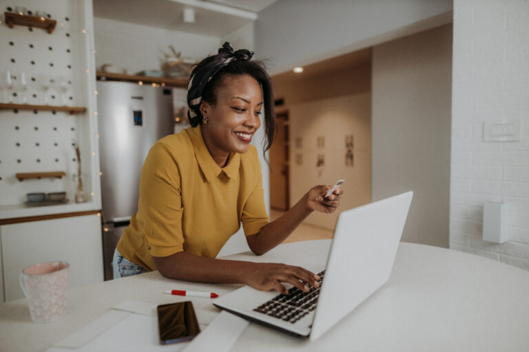 Woman with credit card trying to improve credit score before buying a home
