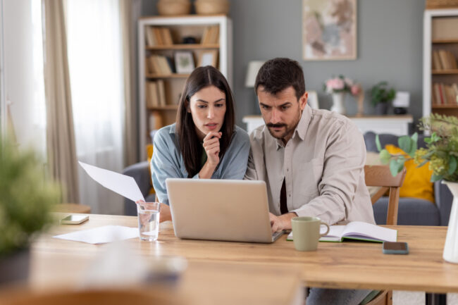 Two Millennial homebuyers looking into home-buying options