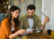 Couple looking over denied mortgage application